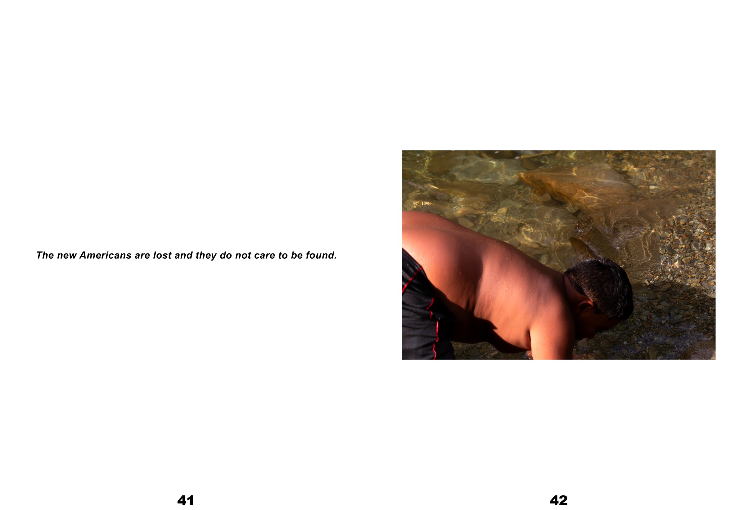 Spread: the line 'The new Americans are lost and they do not care to be found.' at left; a boy bent over clear shallow water at right.